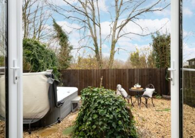 Meadow Cottage is a luxury, dog-friendly holiday chalet with a hot tub, sleeps two | Downwood Holidays, Dorset