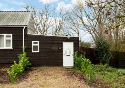 Meadow Cottage is a luxury, dog-friendly holiday chalet with a hot tub, sleeps two | Downwood Holidays, Dorset